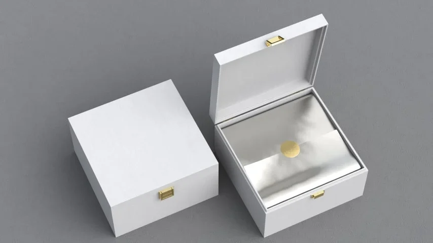 An open presentation box holding a necklace.