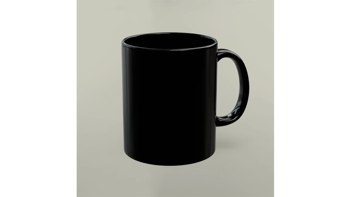 A glossy black ceramic mug shown at an angle with its curved handle visible.